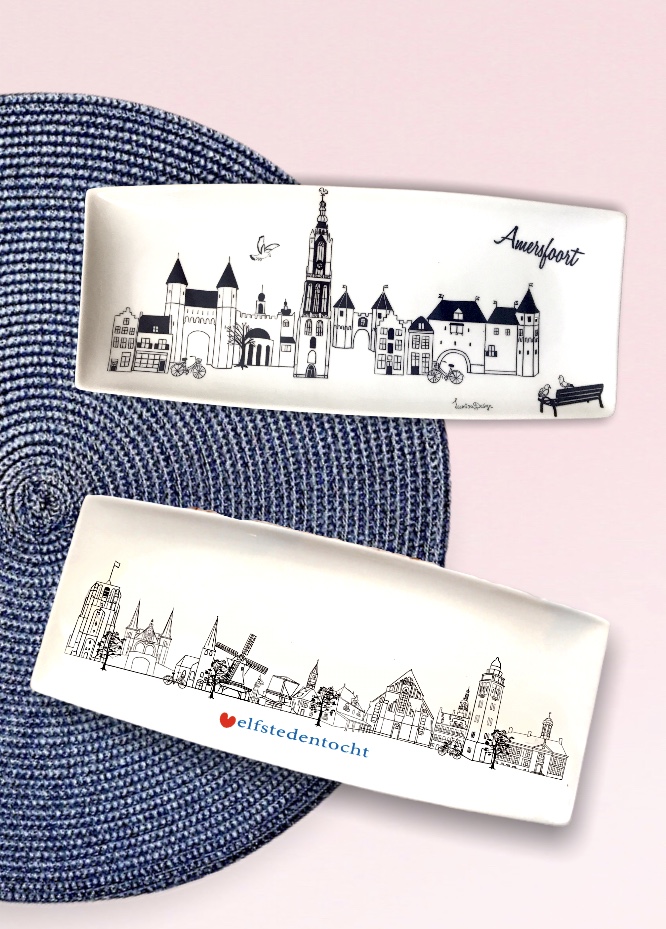 schalen met skyline van een stad in zwart wit